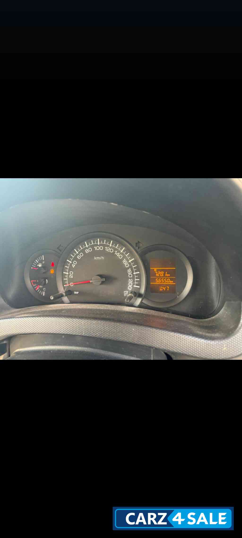 Pearl White Maruti Suzuki Swift Tour S Petrol