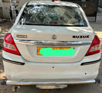 Pearl White Maruti Suzuki Swift Tour S Petrol