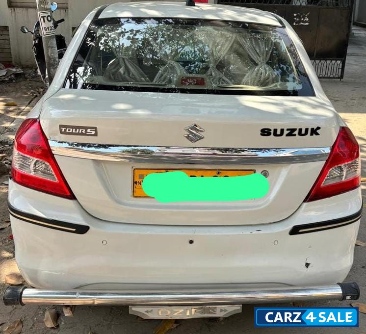 Pearl White Maruti Suzuki Swift Tour S Petrol