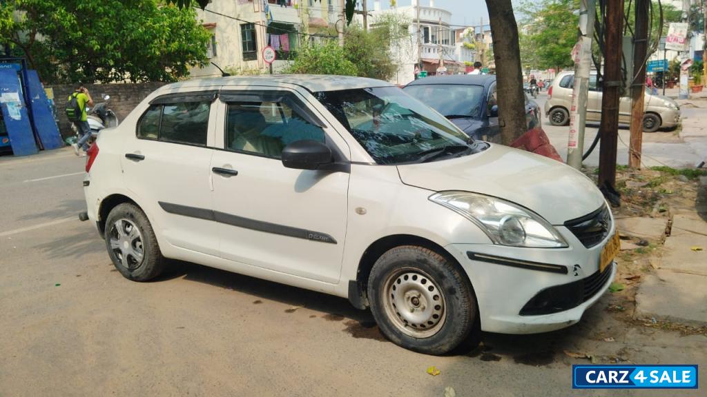 Pearl White Maruti Suzuki Swift Tour S Petrol