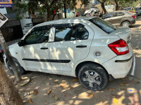 Pearl White Maruti Suzuki Swift Tour S Petrol