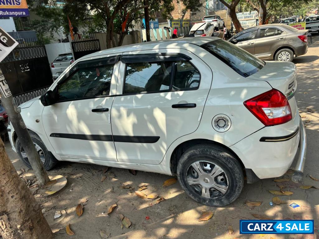 Pearl White Maruti Suzuki Swift Tour S Petrol