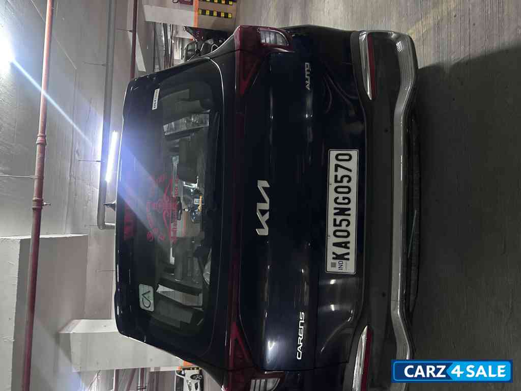 Imperial Blue Kia Carens 1.5 LUXURY AT Diesel 7 STR