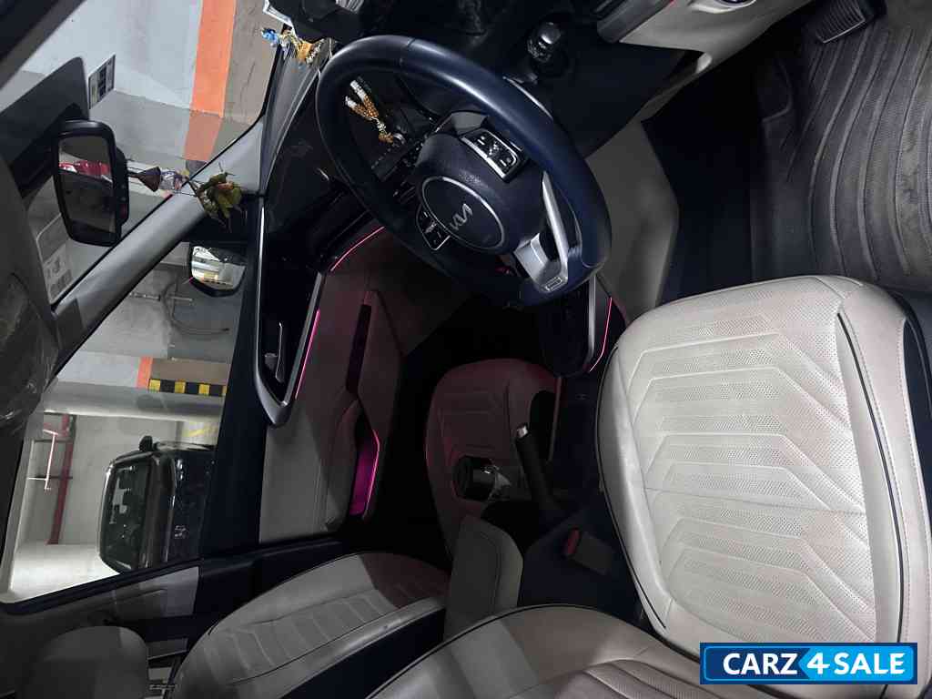 Imperial Blue Kia Carens 1.5 LUXURY AT Diesel 7 STR