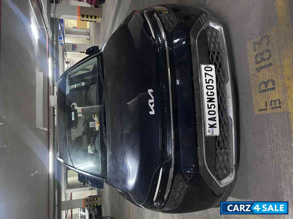 Imperial Blue Kia Carens 1.5 LUXURY AT Diesel 7 STR