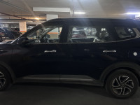 Imperial Blue Kia Carens 1.5 LUXURY AT Diesel 7 STR