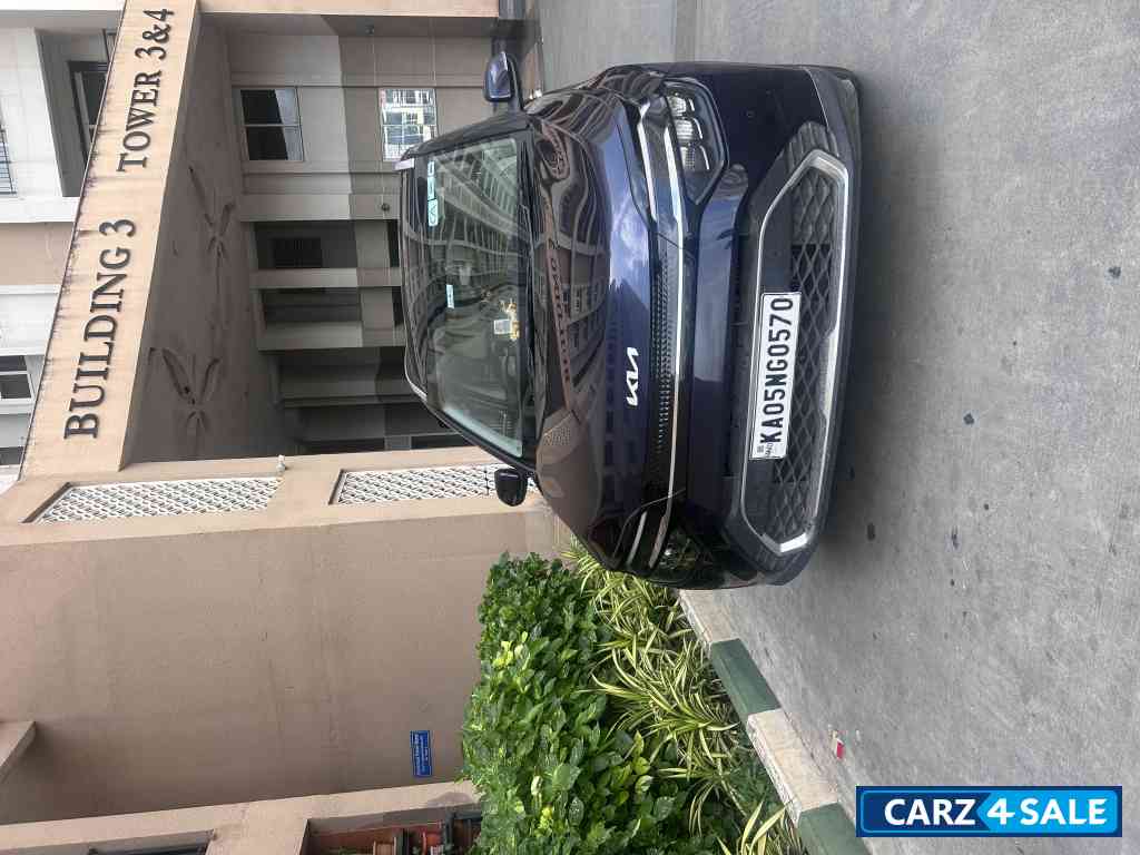 Imperial Blue Kia Carens 1.5 LUXURY AT Diesel 7 STR