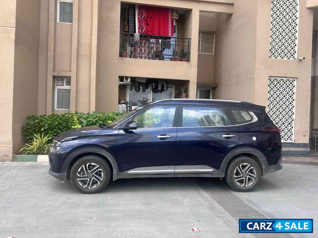 Imperial Blue Kia Carens 1.5 LUXURY AT Diesel 7 STR