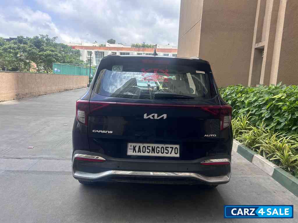 Imperial Blue Kia Carens 1.5 LUXURY AT Diesel 7 STR