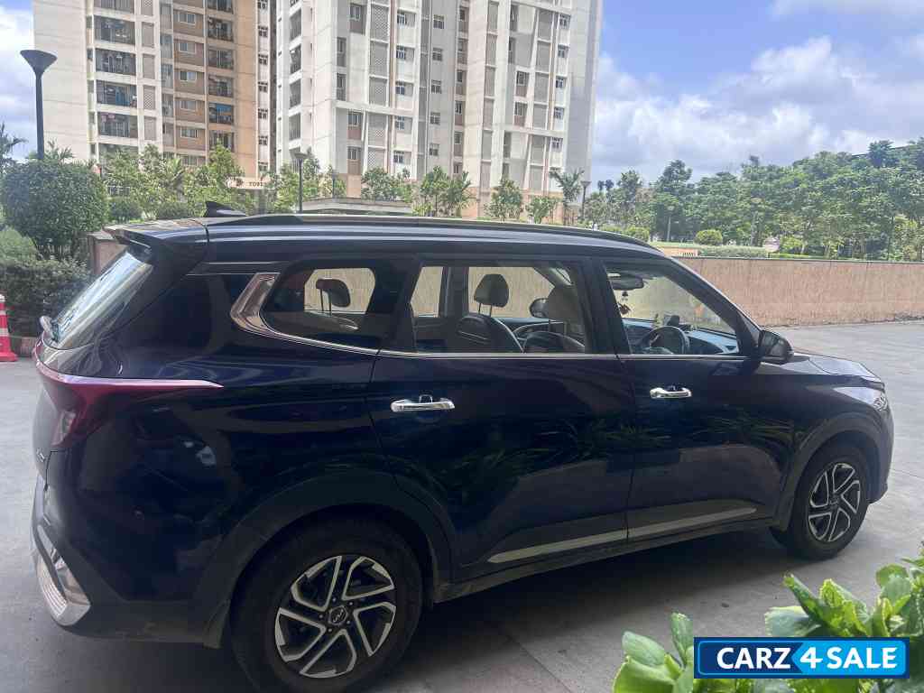 Imperial Blue Kia Carens 1.5 LUXURY AT Diesel 7 STR