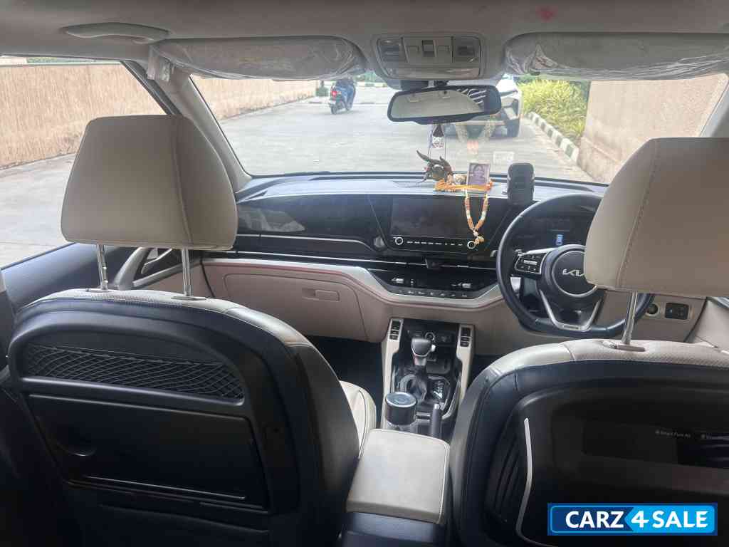 Imperial Blue Kia Carens 1.5 LUXURY AT Diesel 7 STR