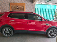 Red Skoda Kushaq petrol