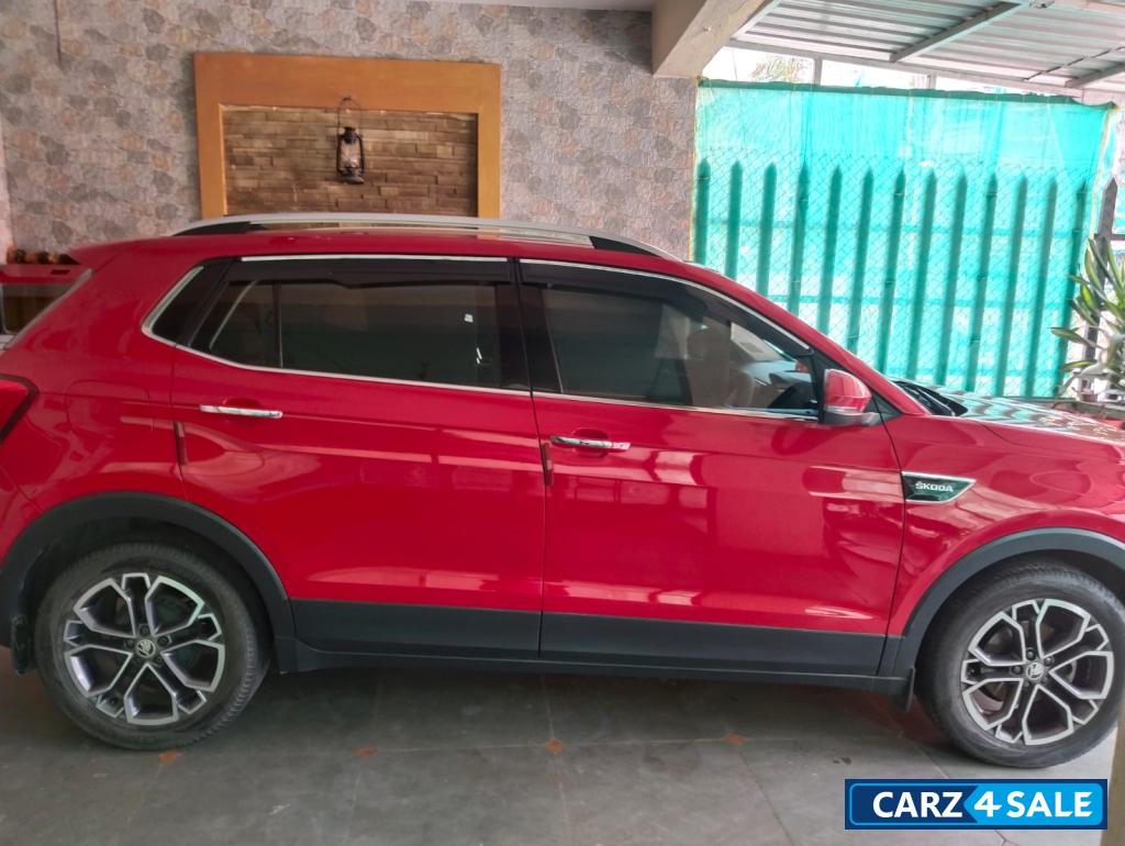 Red Skoda Kushaq petrol Red Skoda Kushaq petrol