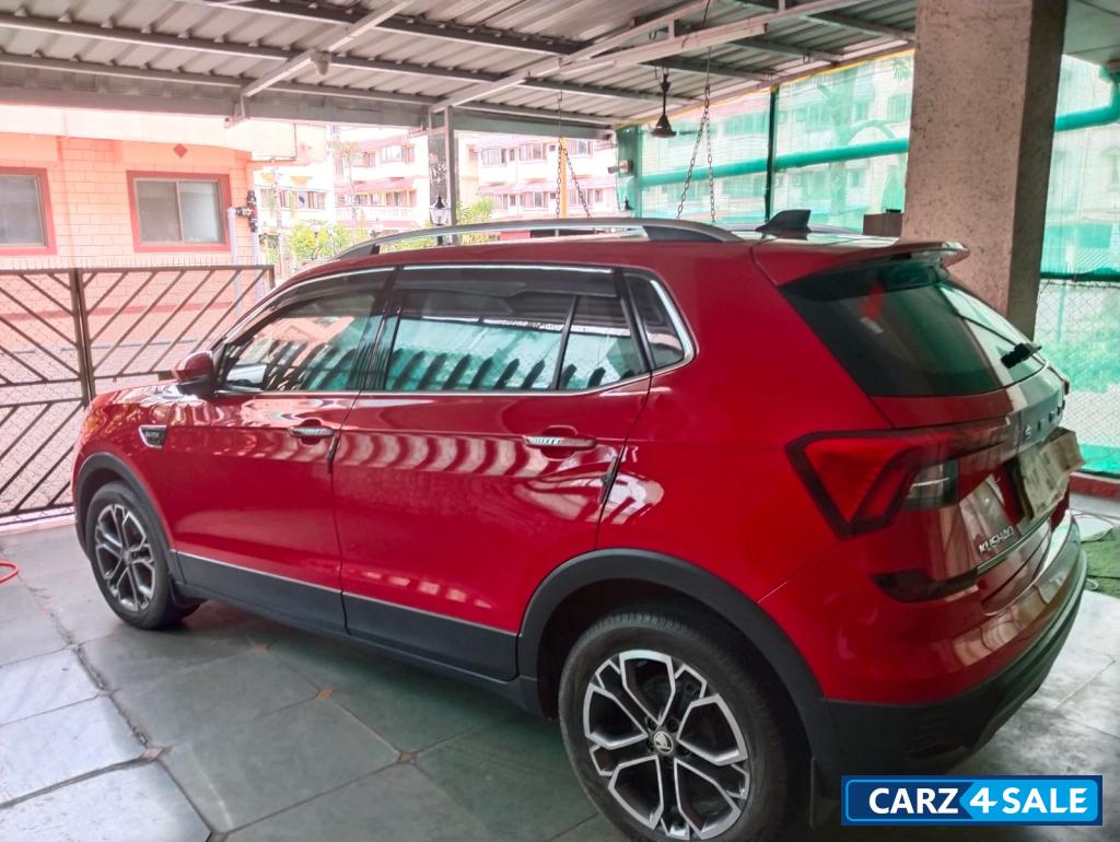 Red Skoda Kushaq petrol Red Skoda Kushaq petrol