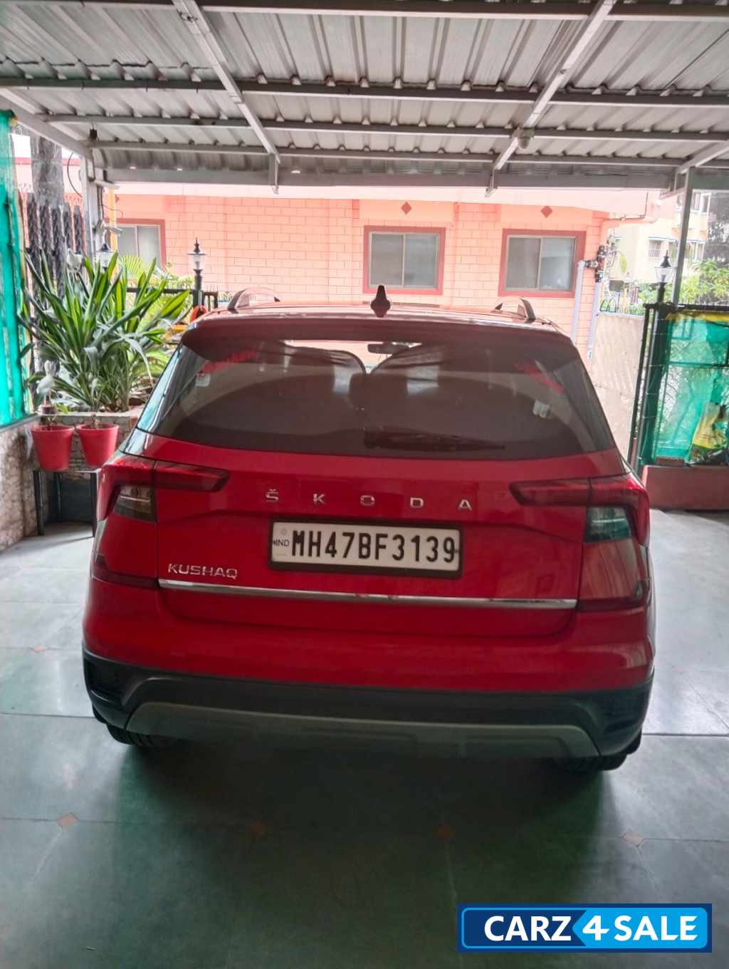 Red Skoda Kushaq petrol Red Skoda Kushaq petrol