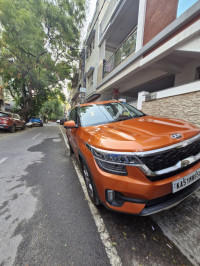 Punchy Orange Kia Seltos HTX diesel MT