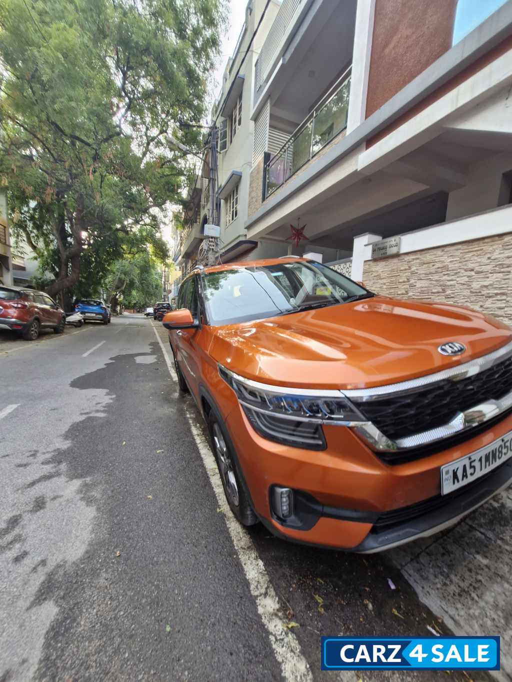 Punchy Orange Kia Seltos HTX diesel MT