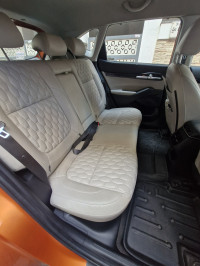 Punchy Orange Kia Seltos HTX diesel MT