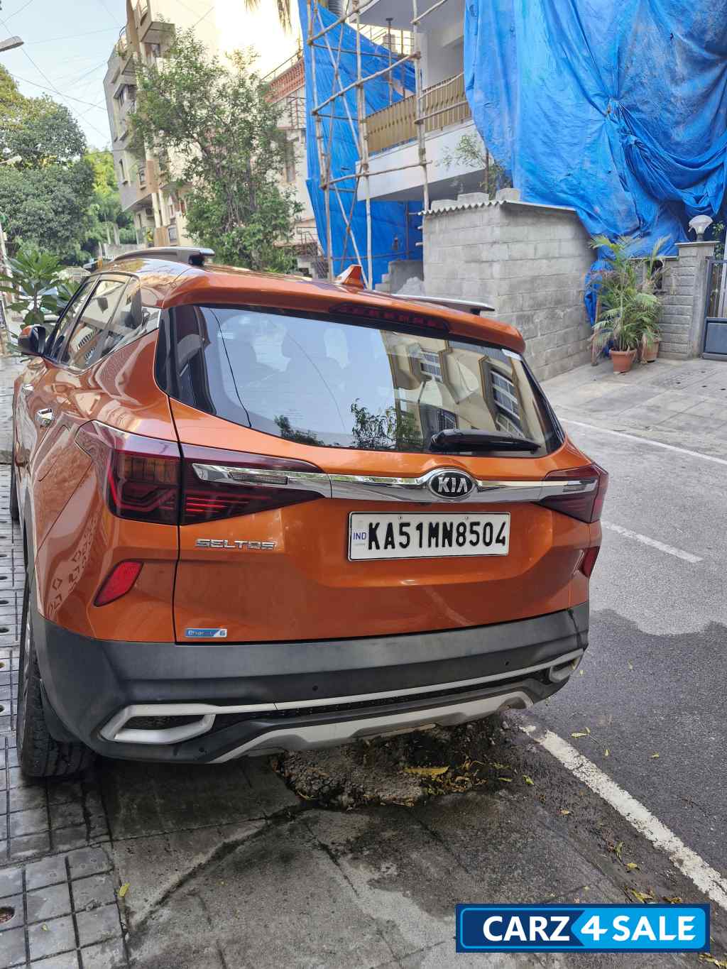 Punchy Orange Kia Seltos HTX diesel MT