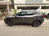 Havana Grey MG Astor Savvy 1.3 Turbo Sangria Red