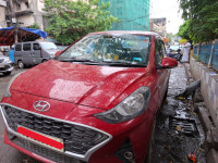 Fiery Red Hyundai Aura