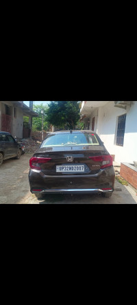 Golden Brown Honda Amaze Smt 1.2