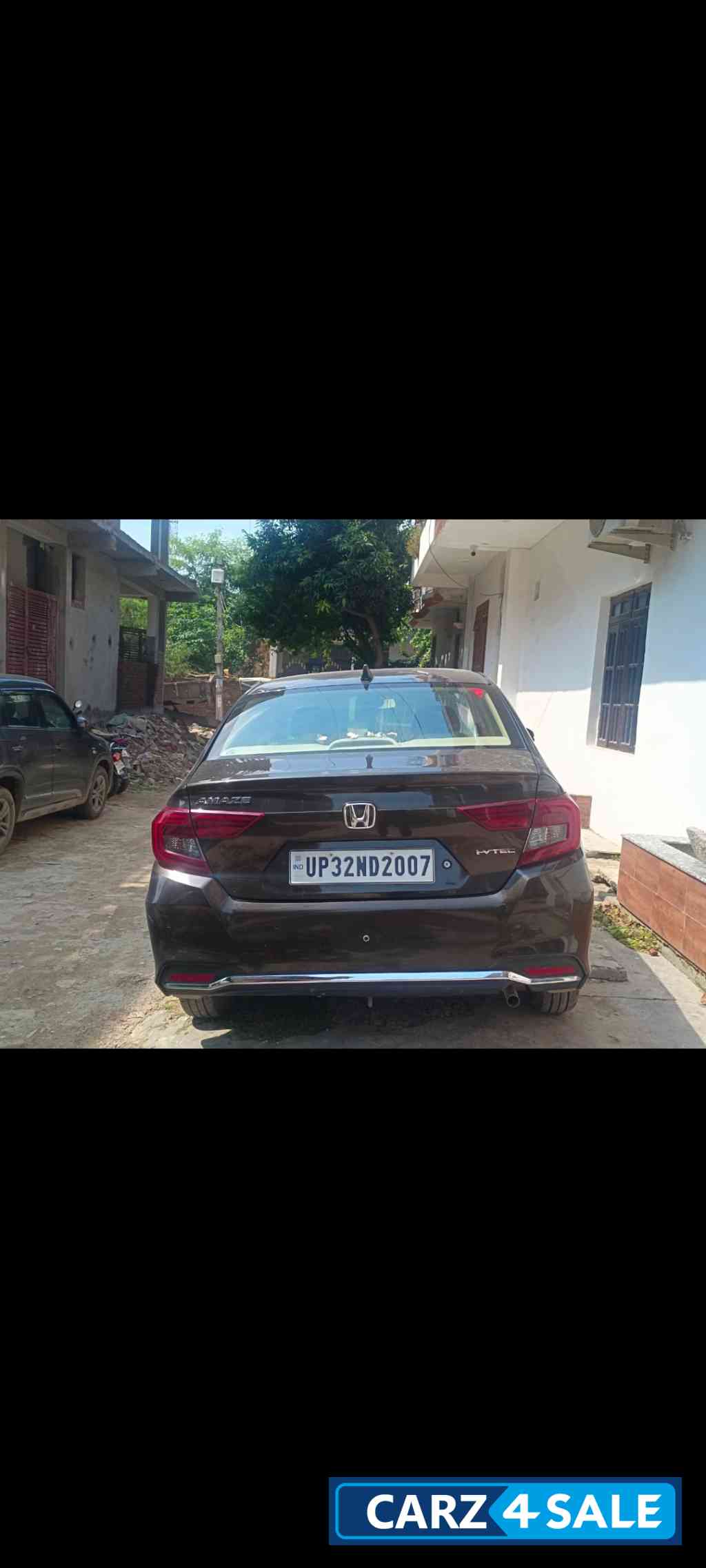 Golden Brown Honda Amaze Smt 1.2