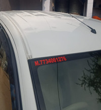 सफेद Maruti Suzuki Ertiga