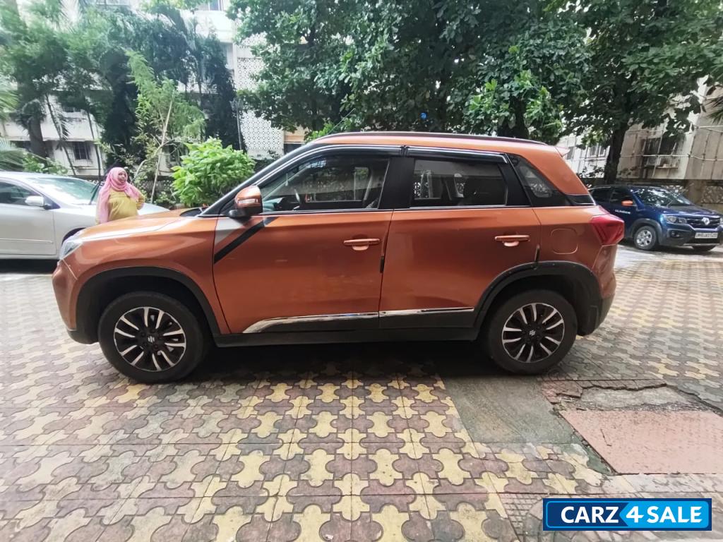 Orange Maruti Suzuki Vitara Brezza Manual