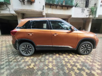 Orange Maruti Suzuki Vitara Brezza Manual