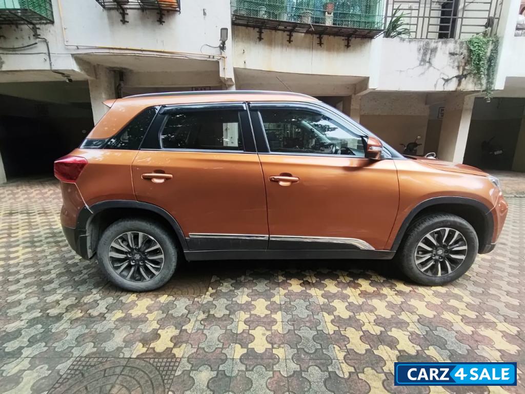 Orange Maruti Suzuki Vitara Brezza Manual