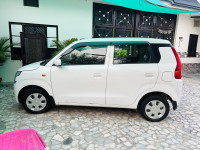 White Maruti Suzuki Wagon R Vxi 1.0