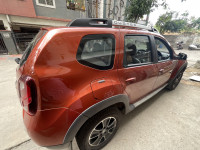 Orange Renault Duster RXZ AWD Diesel