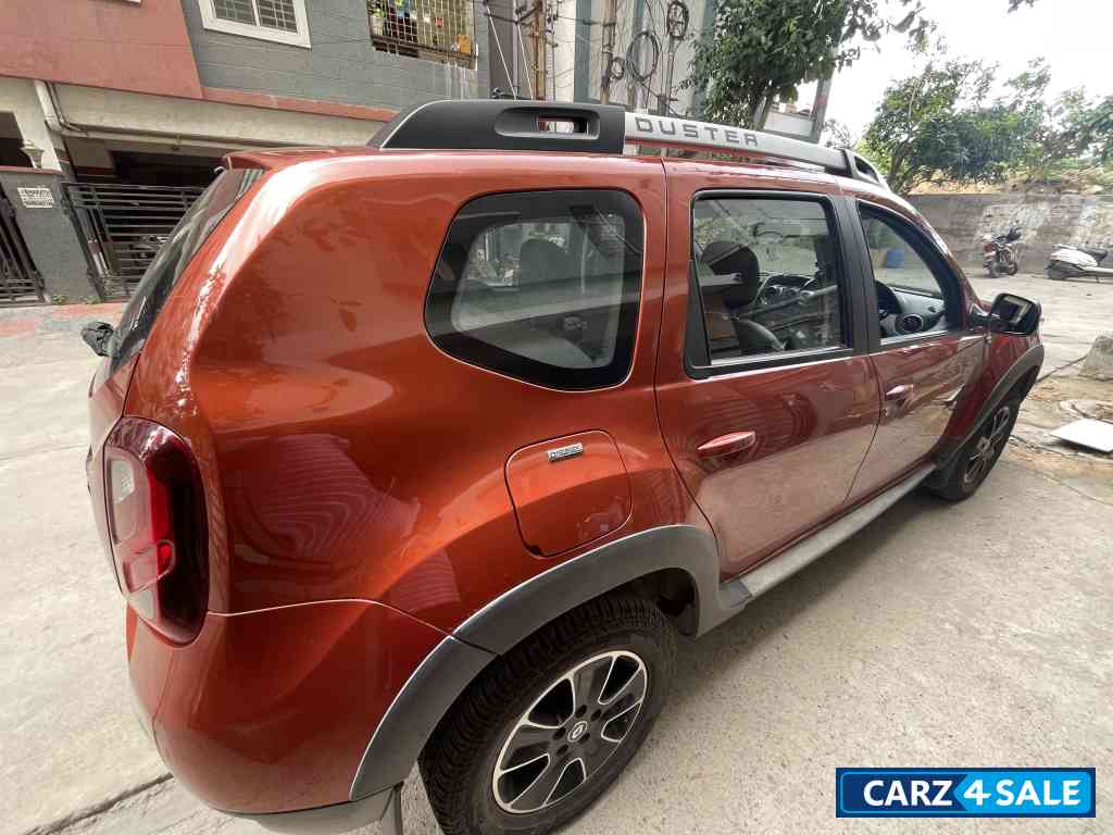 Orange Renault Duster RXZ AWD Diesel