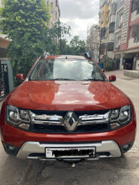Orange Renault Duster RXZ AWD Diesel