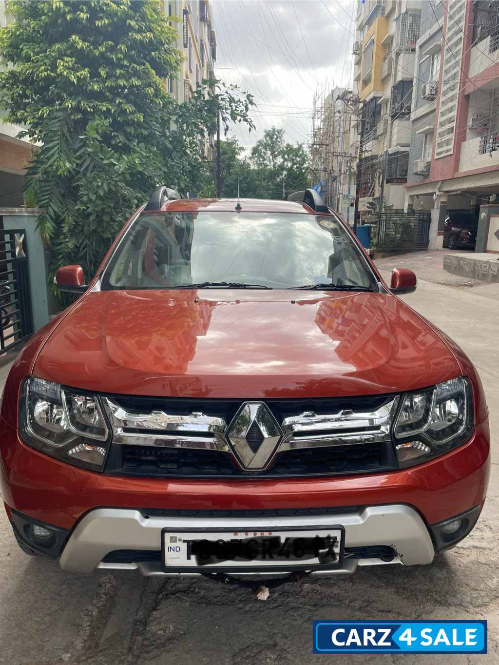 Orange Renault Duster RXZ AWD Diesel