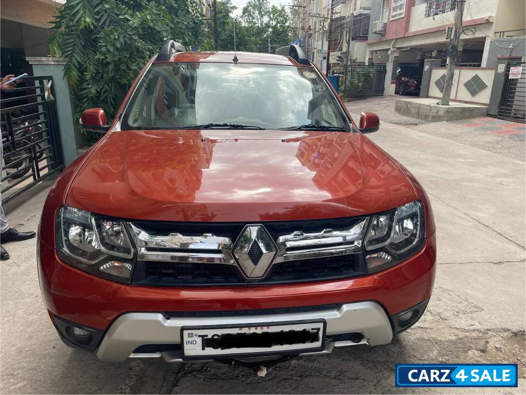 Orange Renault Duster RXZ AWD Diesel