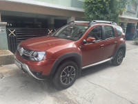 Orange Renault Duster RXZ AWD Diesel