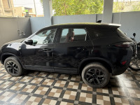 Black Tata Harrier Xza plus red dark