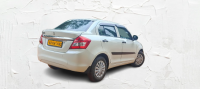 White Maruti Suzuki Dzire Tour S CNG
