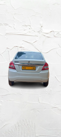 White Maruti Suzuki Dzire Tour S CNG