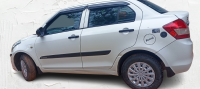 White Maruti Suzuki Dzire Tour S CNG