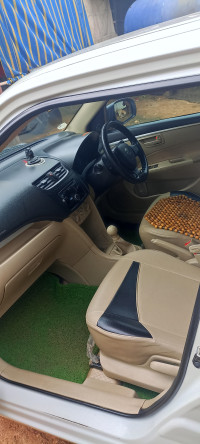 White Maruti Suzuki Dzire Tour S CNG