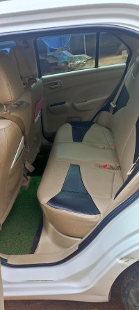 White Maruti Suzuki Dzire Tour S CNG