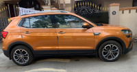 Honey Orange Skoda Kushaq Style 1.0L TSI MT