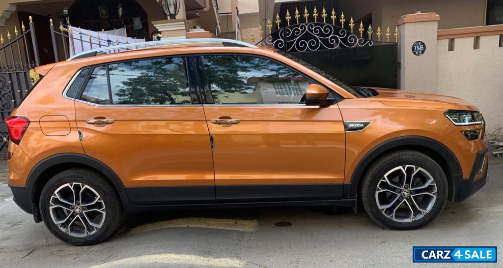 Honey Orange Skoda Kushaq Style 1.0L TSI MT