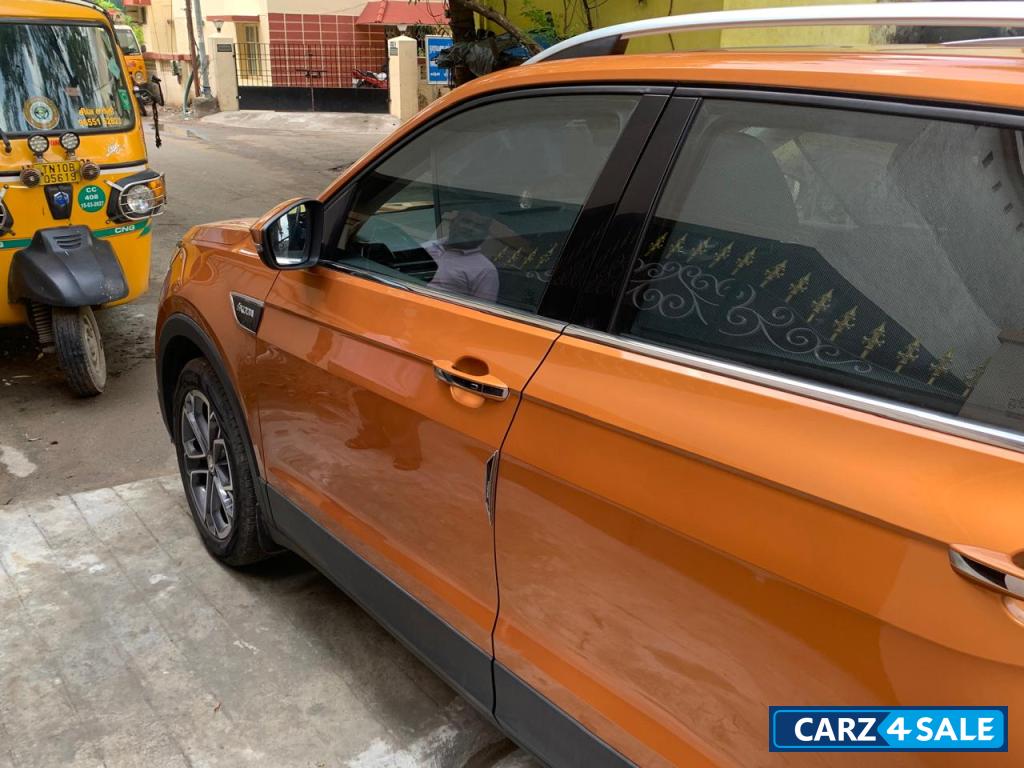 Honey Orange Skoda Kushaq Style 1.0L TSI MT