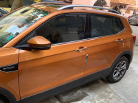 Honey Orange Skoda Kushaq Style 1.0L TSI MT