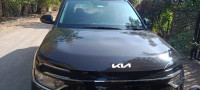 Aurora Black Pearl Kia Carens prestige plus 1.4 turbo 7 str petrol
