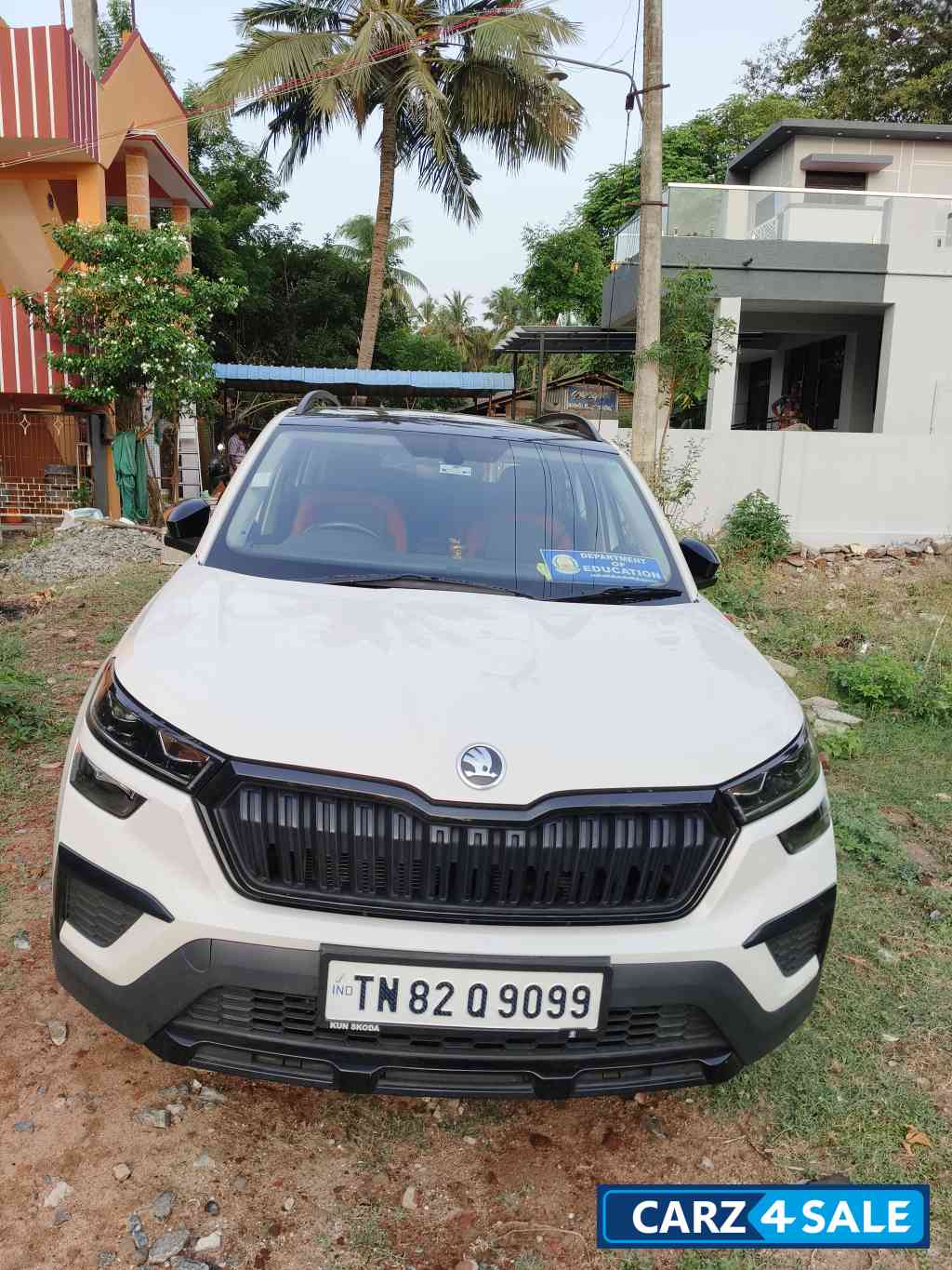 White Skoda Kushaq Mantikarlo